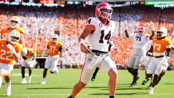 Georgia QB Gunner Stockton scores a touchdown.