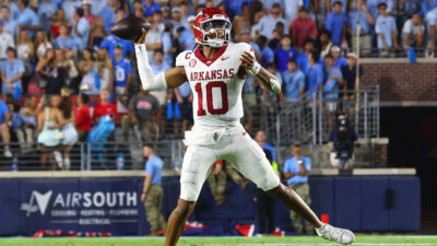 Arkansas QB Taylen Green throws a pass.