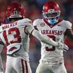 Arkansas players celebrate.