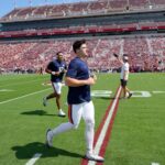 Jackson Arnold warms up before the Auburn vs. Oklahoma game.