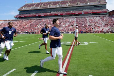 Jackson Arnold warms up before the Auburn vs. Oklahoma game.