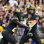 Mizzou QB Beau Pribula hands off to Ahmad Hardy.