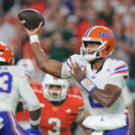 DJ Lagway attempts a pass.