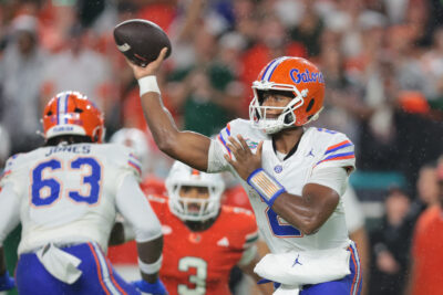 DJ Lagway attempts a pass.