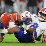 DJ Lagway gets tackled in the Miami game.