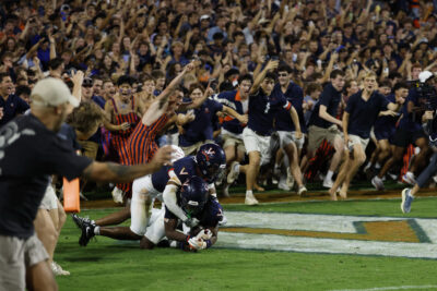 Virginia fans rushed the field after beating Florida State.