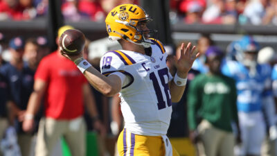 Garrett Nussmeier throws a pass.