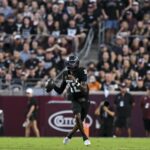Marcel Reed throws a pass.