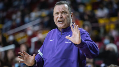 Billy Gillispie coaches during a game.