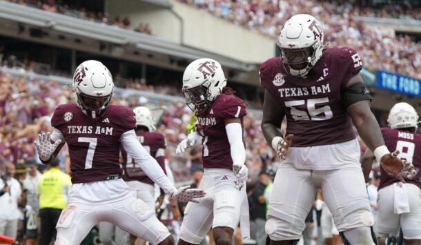 Texas A&M players celebrate a touchdown.