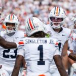 Auburn players celebrate.