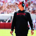Kalen DeBoer coaches during a game.