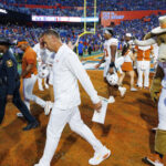 Texas coach Steve Sarkisian walks off the field.