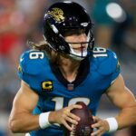 Trevor Lawrence looks to make a play.