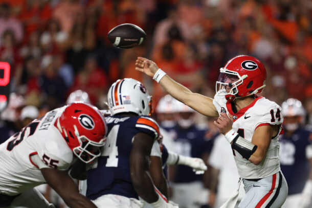 Georgia quarterback Gunner Stockton throws a pass.