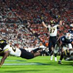 Mizzou running back Ahmad Hardy scores a touchdown.