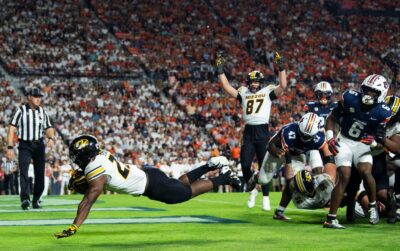 Mizzou running back Ahmad Hardy scores a touchdown.