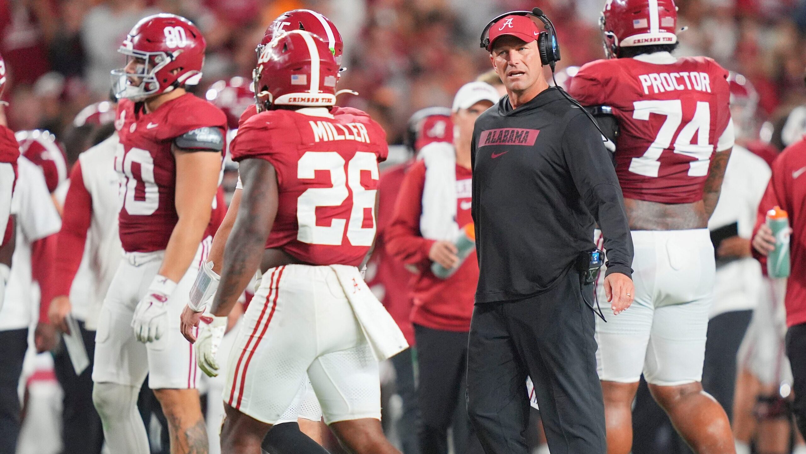 Alabama staffer prevents Oklahoma players from taking celebratory photos at midfield
