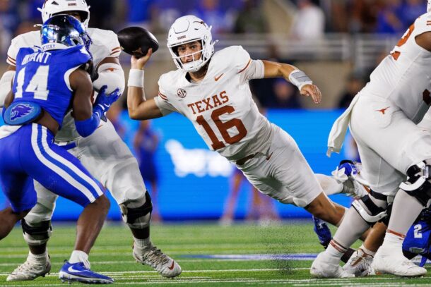Arch Manning attempts a pass against Kentucky.