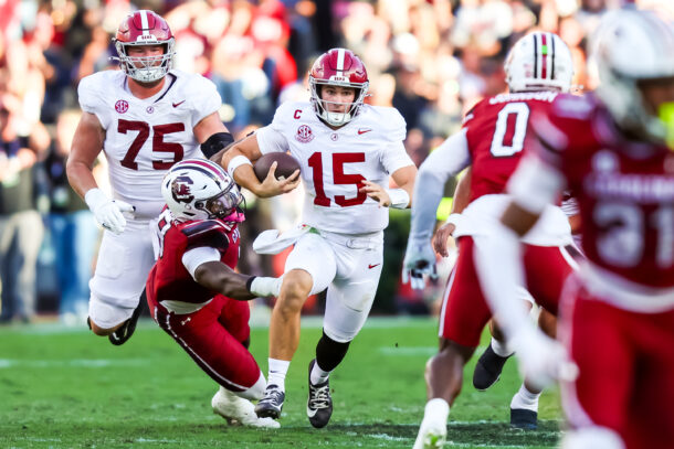 Ty Simpson runs the ball.