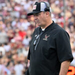 Bill O'Brien coaches during a game.