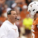 Steve Sarkisian and Arch Manning talk.