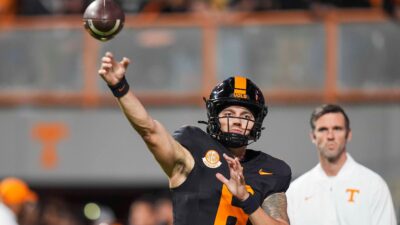 Tennessee quarterback Joey Aguilar warms up in 'Dark Mode' uniform.