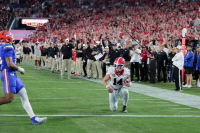 Gunner Stockton takes a knee.