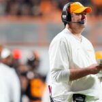 Josh Heupel coaches during a game.