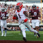 Georgia wide receiver Zachariah Branch scores a touchdown.