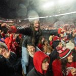 Wisconsin fans storm the field.