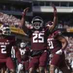 Texas A&M defense celebrates.