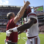 Nyck Harbor celebrates a touchdown.
