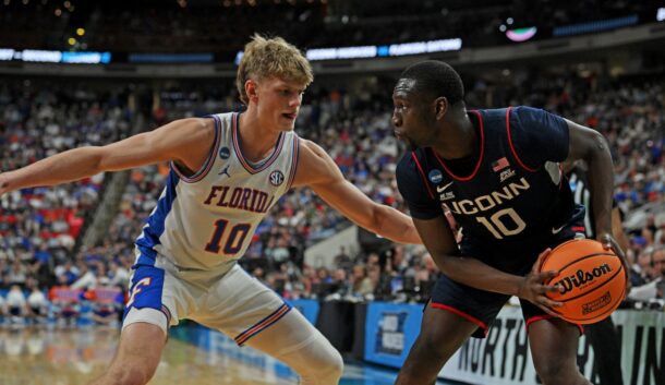 Florida's Thomas Haugh defends a UConn player.