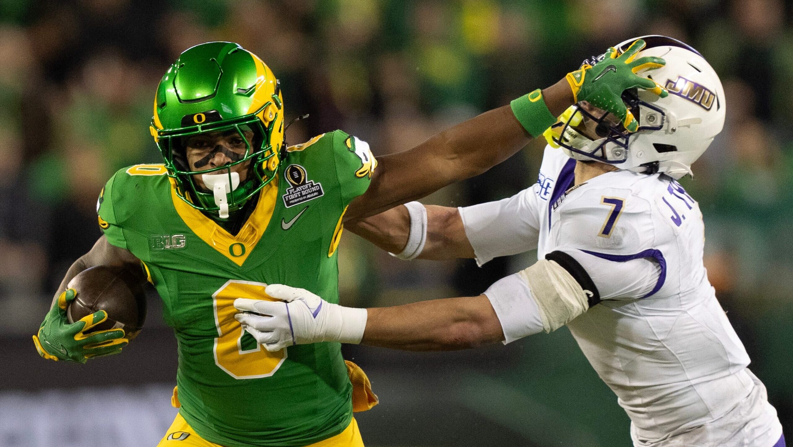 College football fans, media berate CFP format as Oregon routs James Madison