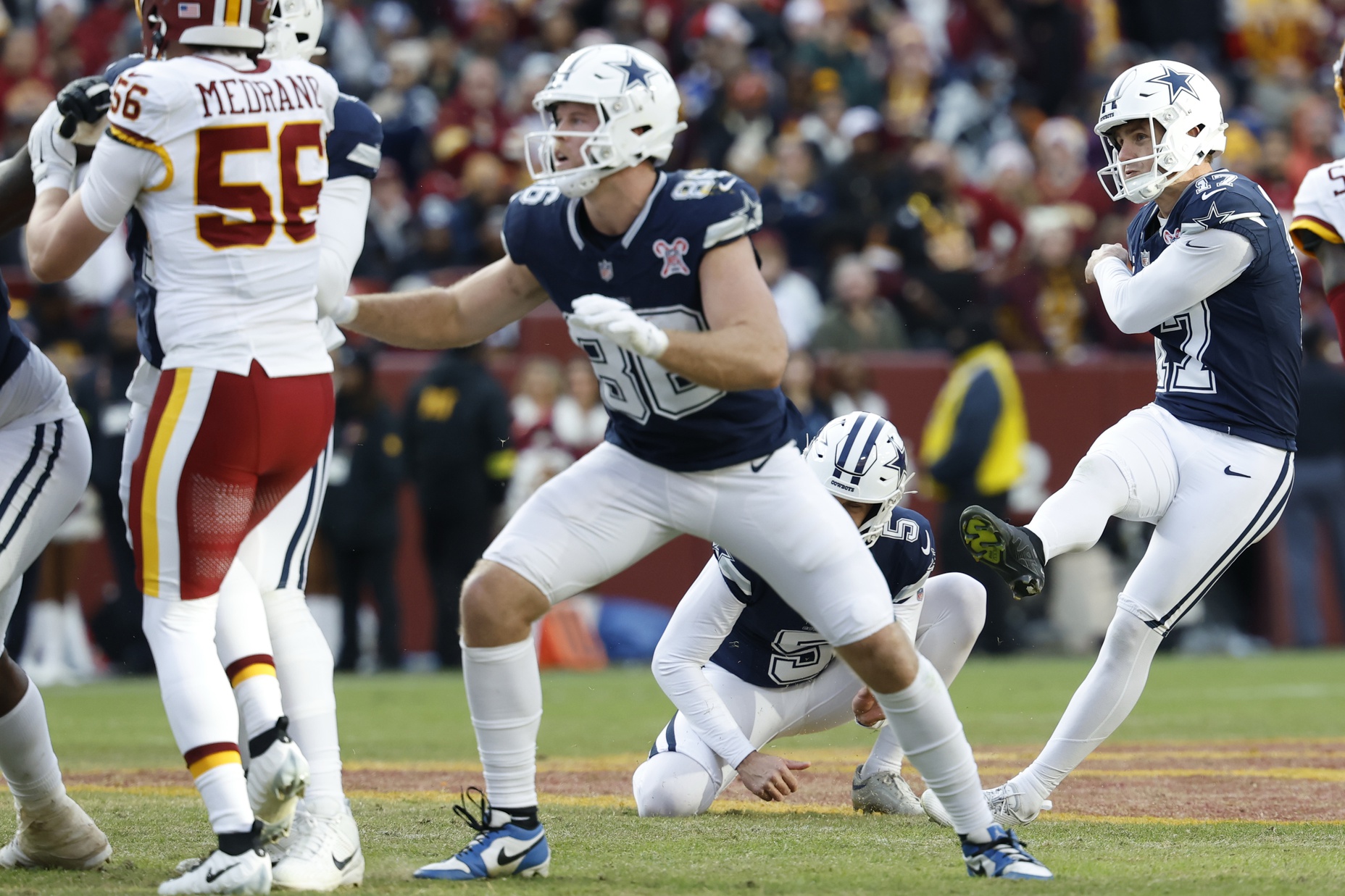 NFL cameraman takes wayward Christmas Day field goal to the face