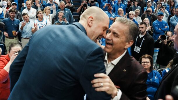Mark Pope and John Calipari.