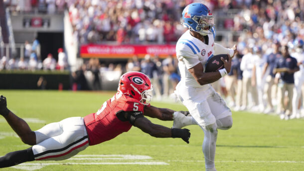 Trinidad Chambliss runs the ball against Georgia.
