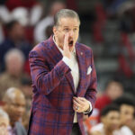 John Calipari coaches Arkansas against Kentucky.
