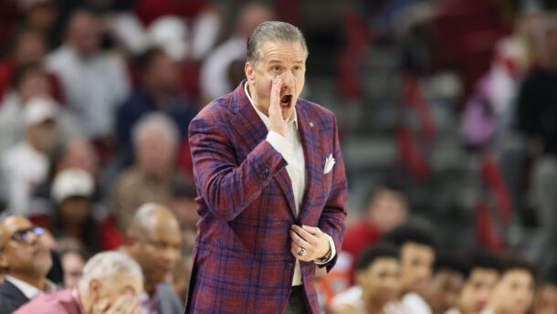 John Calipari coaches Arkansas against Kentucky.