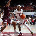 Labaron Philon takes the ball into the paint.