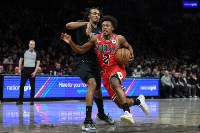 Collin Sexton drives the ball.