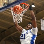 Duke Blue Devils center Patrick Ngongba II dunks the ball gainst the Syracuse Orange
