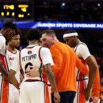Auburn basketball huddle.