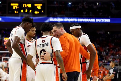 Auburn basketball huddle.