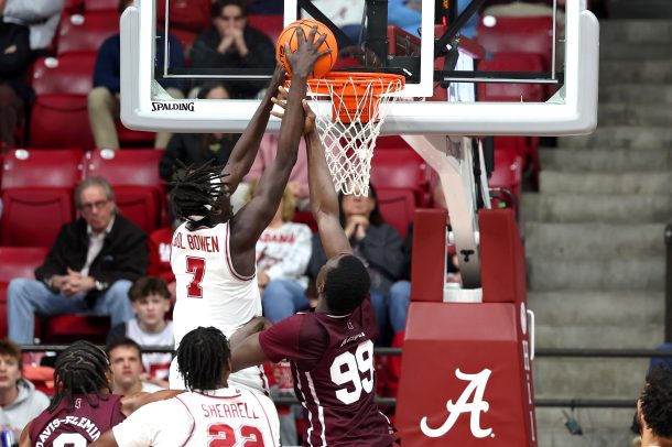 Alabama Crimson Tide forward Taylor Bol Bowen shoots against Mississippi State Bulldogs forward Achor Achor