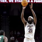 Mackenzie Mgbako shoots the ball.