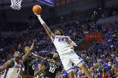 Isaiah Brown makes a layup over Mississippi State Bulldogs forward Jamarion Davis-Fleming