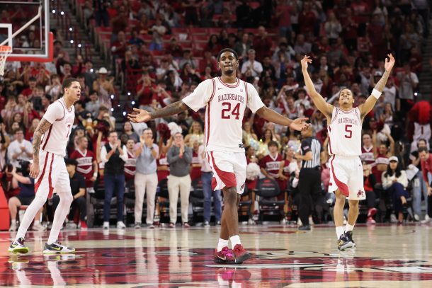 Billy Richmond III and guard Darius Acuff Jr celebrate after a play against the Texas Longhorns