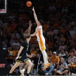 J.P. Estrella shoots the ball against Vanderbilt